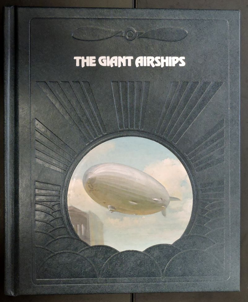 Colour picture of book cover showing a round painting of an airship amongst clouds